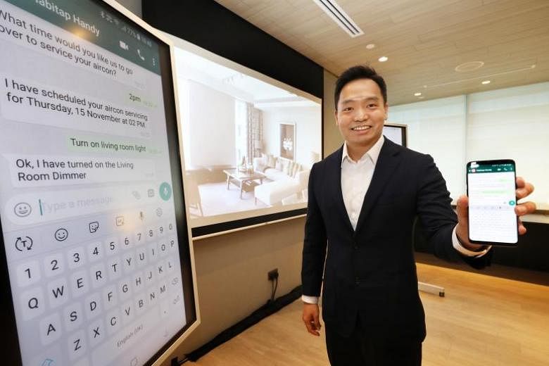 Habitap CEO and founder Franklin Tang demonstrating the features of Habitap Handy, an AI-powered assistant that can accept instructions via WhatsApp to perform tasks for a smart home powered by Habitap's digital living platform.