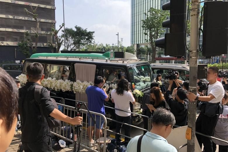 CGTN - The funeral of Louis Cha Leung-yung, China's most