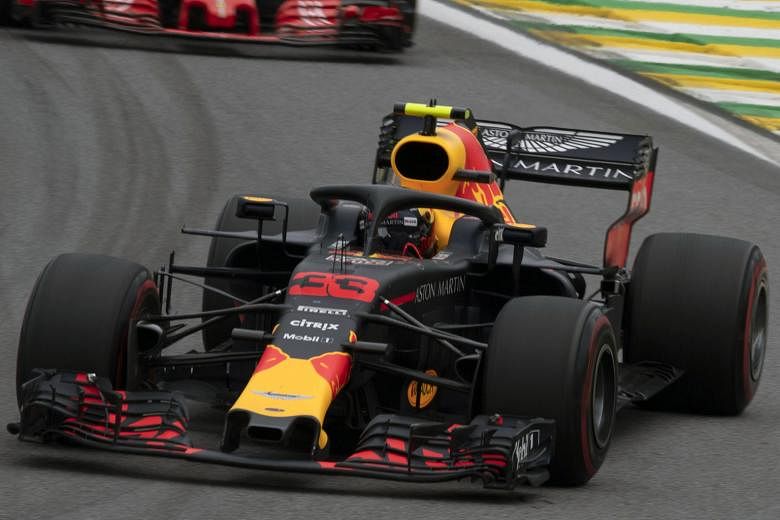 Red Bull's Max Verstappen confronted Esteban Ocon after a collision robbed him of victory at the Brazilian Grand Prix.