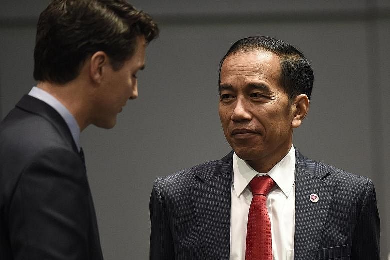 Indonesian President Joko Widodo outlined four conditions members ought to keep in mind as they work to close the deal.