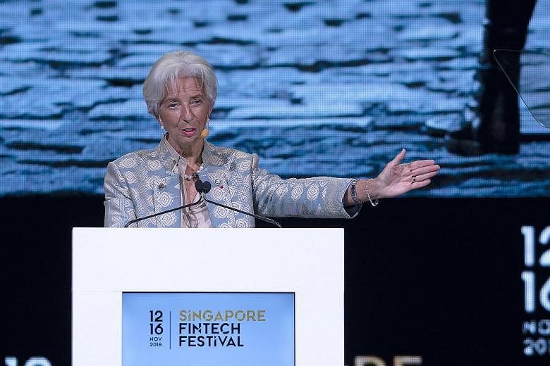 IMF managing director Christine Lagarde, speaking at the Singapore Fintech Festival yesterday, said central banks do not have to design digital currencies on their own, but can work with private firms to come up with solutions that allow financial in