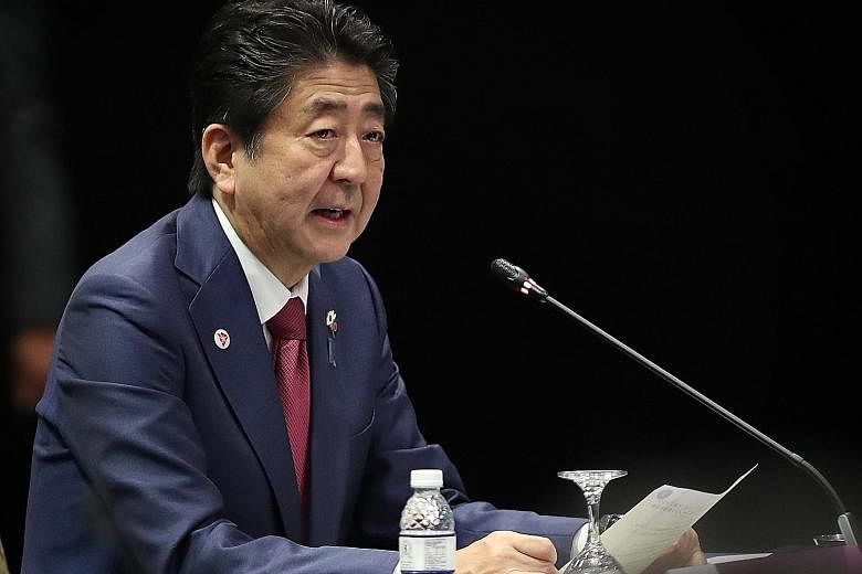 Japanese Prime Minister Shinzo Abe said that his country has "outperformed" its two trillion yen (S$24.3 billion) commitment to Asean.