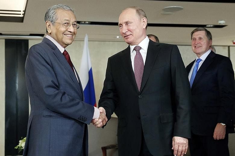 Malaysian Prime Minister Mahathir Mohamad and Russian President Vladimir Putin at a meeting on Tuesday on the sidelines of the Asean Summit.