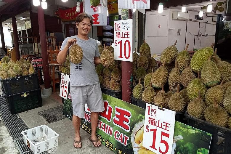 King Fruits Durian slashed its prices to $10 a durian on Monday. Slow customer traffic is a key factor in this price drop.