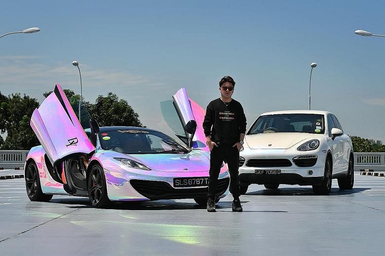 Mr David Yong paid about $500,000 for the McLaren MP4-12C coupe (left), which he drives mostly on weekends. He drives the Porsche Cayenne (right) daily.