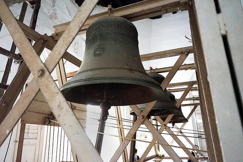 Above: The eight bells in St Andrew's Cathedral's belfry were given to the cathedral in 1889 by the heirs of an English captain and cast in the same foundry as the bells of St Paul's Cathedral in London. Below: The cathedral, located in the heart of 