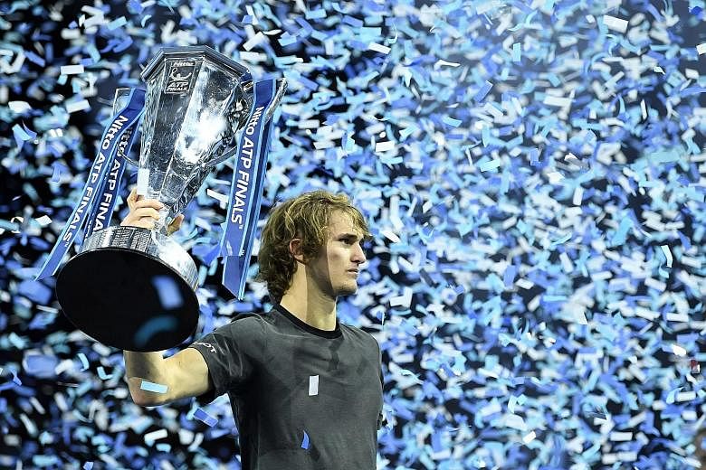 Alexander Zverev beat world No. 1 Novak Djokovic in straight sets in London on Sunday to win his first ATP Finals title.