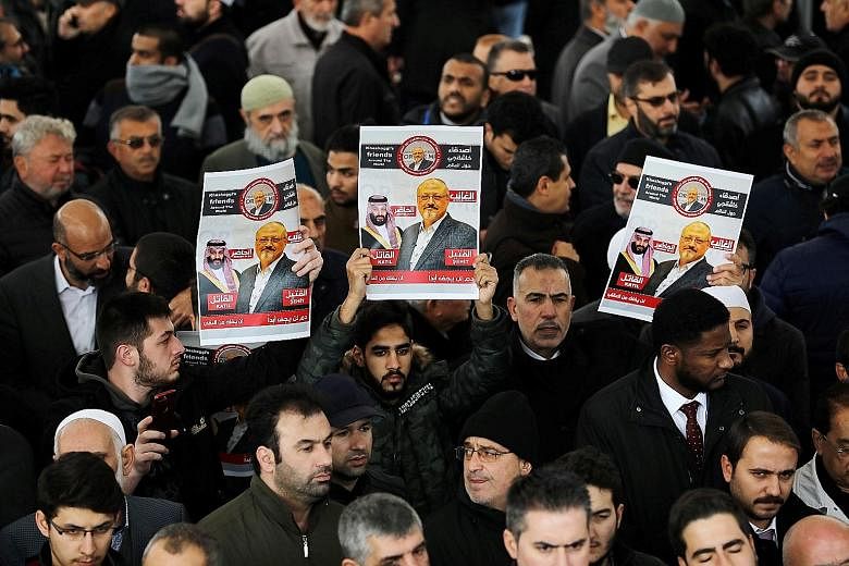 Top: People holding up photos of slain journalist Jamal Khashoggi during funeral prayers at the Fatih mosque in Istanbul last Friday. The CIA believes his death was ordered directly by Crown Prince Mohammed bin Salman (above), Saudi Arabia's de facto