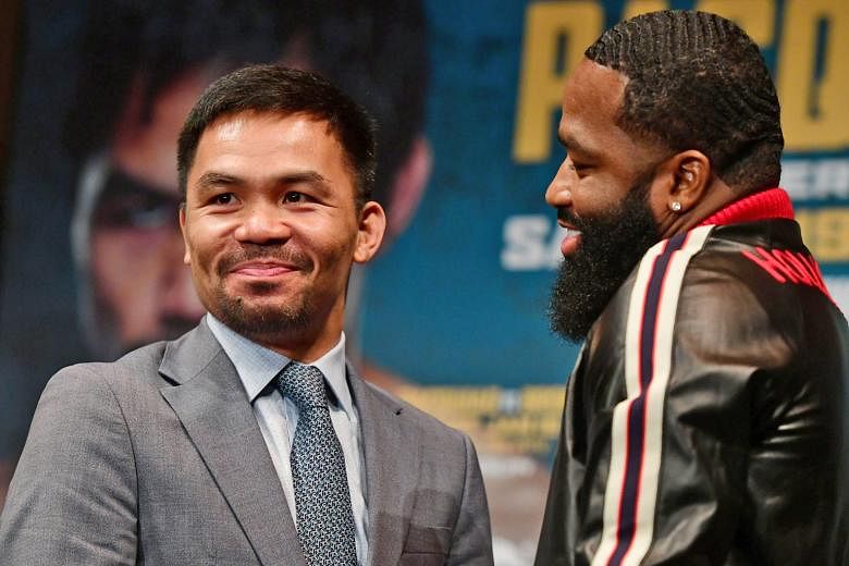 Manny Pacquiao and Adrien Broner facing off in New York on Monday for their Jan 19 welterweight fight. Pacquiao wants Freddie Roach, his long-time trainer, to return and be in his corner in Las Vegas.