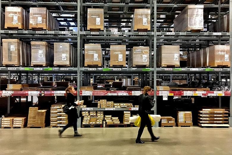 Shoppers in an Ikea store in Stockholm last month. The job cuts planned by the Swedish furniture giant relate to Ingka, the franchisee that owns and operates stores in the United States, Europe and some parts of Asia.