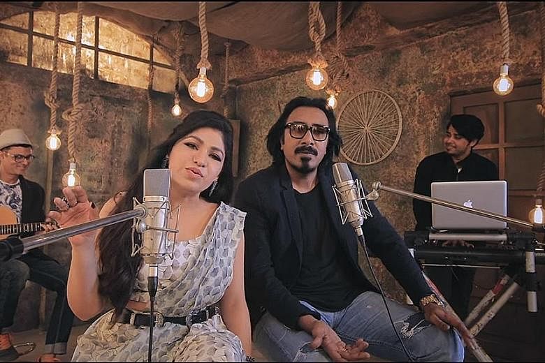 Popular Indian singers (from far left) Tulsi Kumar and Arko in a screengrab of a music video on T-Series, a video channel that is growing so fast it will likely dethrone PewDiePie (above) as the top channel on YouTube.