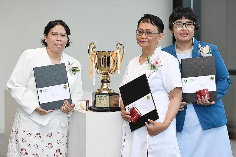 (From left) Tan Chin Tuan Nursing Award first-prize winner Rahinah Ibrahim of the Institute of Mental Health, second-prize winner Faridah Hassan of Ng Teng Fong General Hospital and third-prize winner Jenny Yong of the Home Nursing Foundation. Seven 