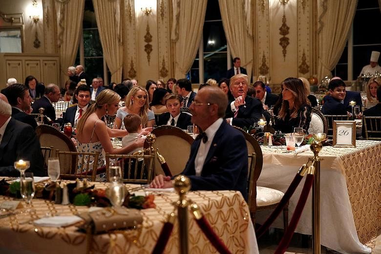 US President Donald Trump and First Lady Melania Trump having Thanksgiving dinner with their family at his Mar-a-Lago resort in Florida on Thursday. Asked what he was most thankful for - a question that for commanders-in-chief usually prompts praise 