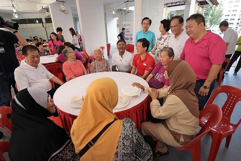 Then Minister in the Prime Minister's Office Chan Chun Sing (fifth from far left) with MP Murali Pillai (fourth from left) during a ministerial community visit to Mr Murali's Bukit Batok ward in July last year. Mr Chan seems to have stayed true to hi