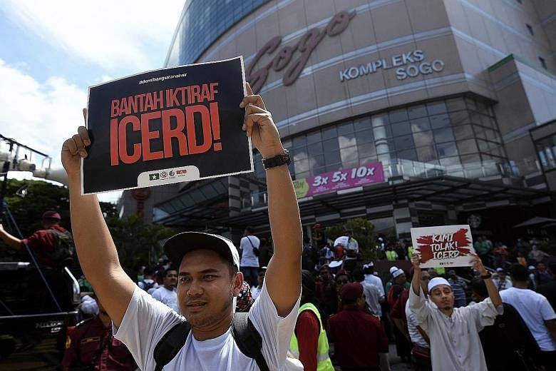 Protesters at an anti-ICERD demonstration organised by Umno Youth and PAS Youth in Kuala Lumpur earlier this month. Malay and Muslim groups fear ratifying the UN human rights convention would weaken the rights of Malays and Malay royalty, as well as 