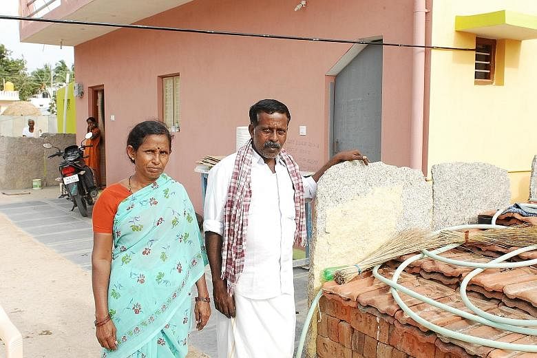 The world's largest solar farm, Shakti Sthala, is the size of more than 8,000 football fields and will have a capacity of 2,000 megawatts when completed by July next year. Mr K. Ramachandra and his wife Narayanamma in front of the house they have con