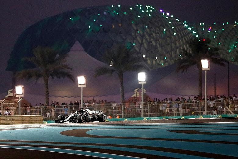 Lewis Hamilton breaking the track record in his pole lap of 1min 34.794sec on the Yas Marina Circuit in Abu Dhabi yesterday. Teammate Valtteri Bottas will start alongside him.
