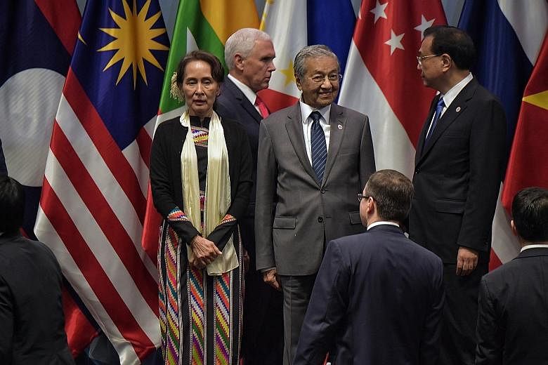 From left: Myanmar State Counsellor Aung San Suu Kyi, US Vice-President Mike Pence, Malaysian Premier Mahathir Mohamad and China Premier Li Keqiang at the 13th East Asia Summit in Singapore this month.