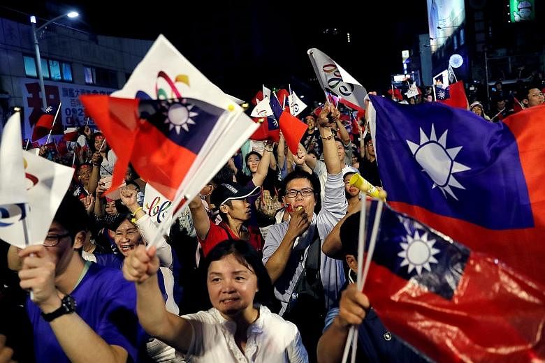 Supporters of Kaohsiung mayoral candidate Han Kuo-yu of the opposition KMT celebrating his victory in Kaohsiung on Saturday. "Han Kuo-yu was the fuse that ignited the people's unhappiness with DPP," said one political commentator.