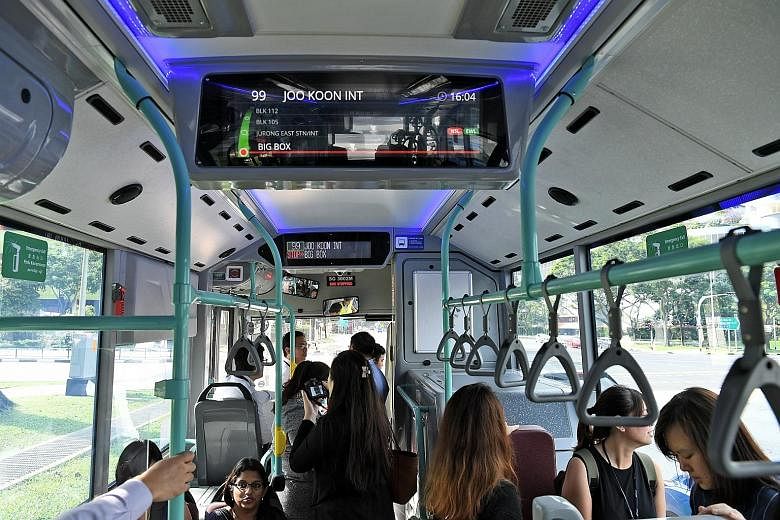 An enhanced information display system (left, above) features an LCD screen inside the bus displaying information such as the service number, final destination and upcoming stops, as well as nearby MRT and LRT stations and the lines they are on. The 