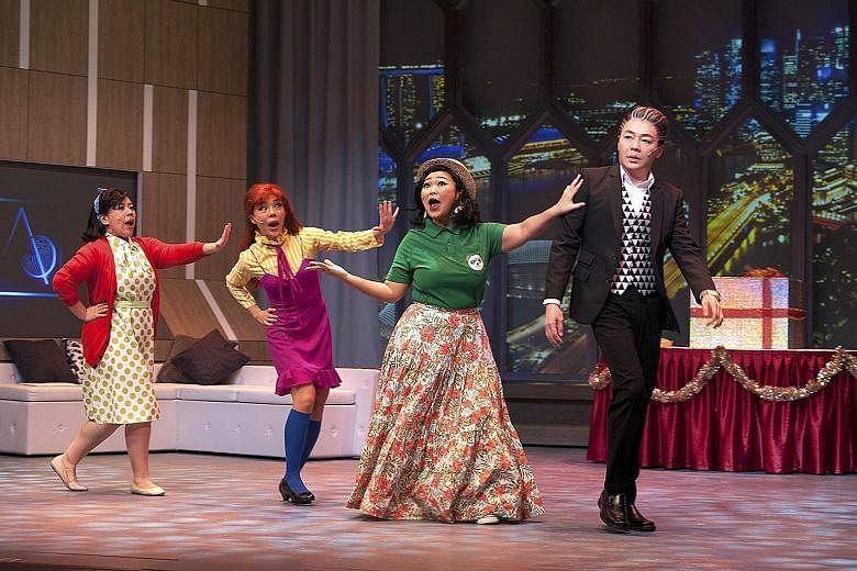 Sebastian Tan as a multimillionaire Scrooge with (from far left) Candice de Rozario, Audrey Luo and Siti Khalijah Zainal as the three ghosts who appear to get him into the Christmas spirit.