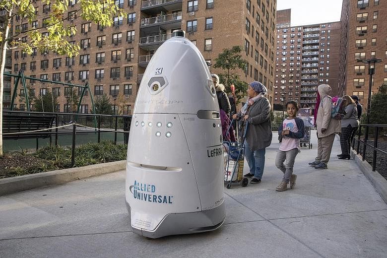 Rosie the robot ambles through the grounds of LeFrak City, a housing complex in Queens, New York, acting as an extra set of eyes for the security team.