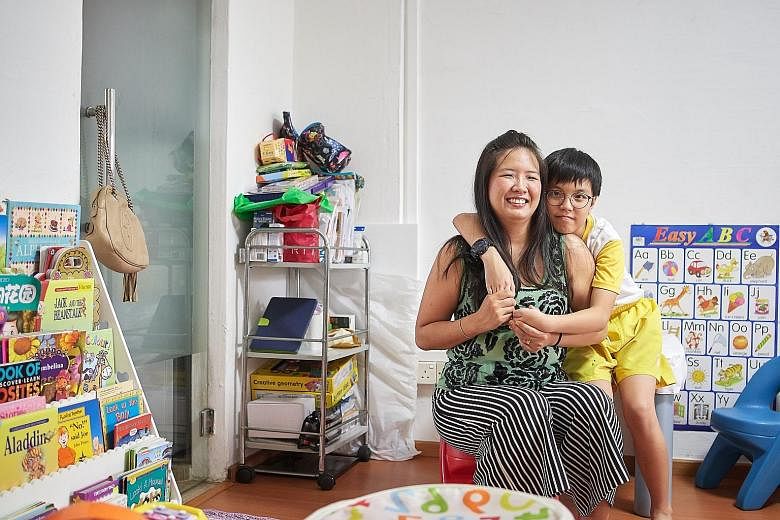 Ms Ju-ann Thong and son Mathias, 12, at home. She is now a mother of three. Daughter Meagan is two and youngest son Mikel is just over a year old.