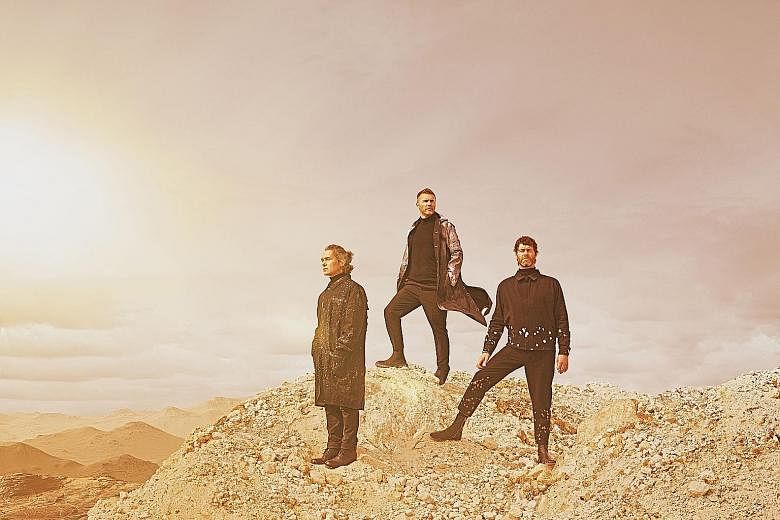 The remaining members of Take That are (from far left) Mark Owen, Gary Barlow and Howard Donald.