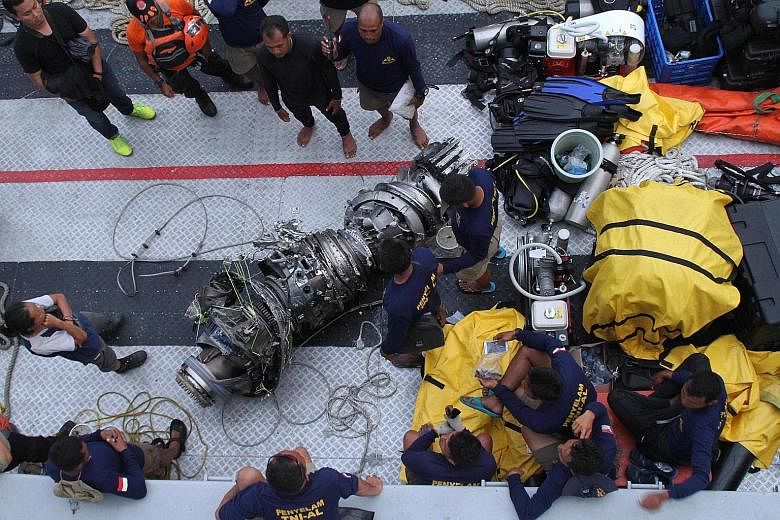 Parts of an engine of the Lion Air Flight JT610 recovered from the sea during search operations in the Java Sea on Nov 3. Flight recorder data showed that the plane's nose was forced down by an automated anti-stall system, meant to protect the plane 