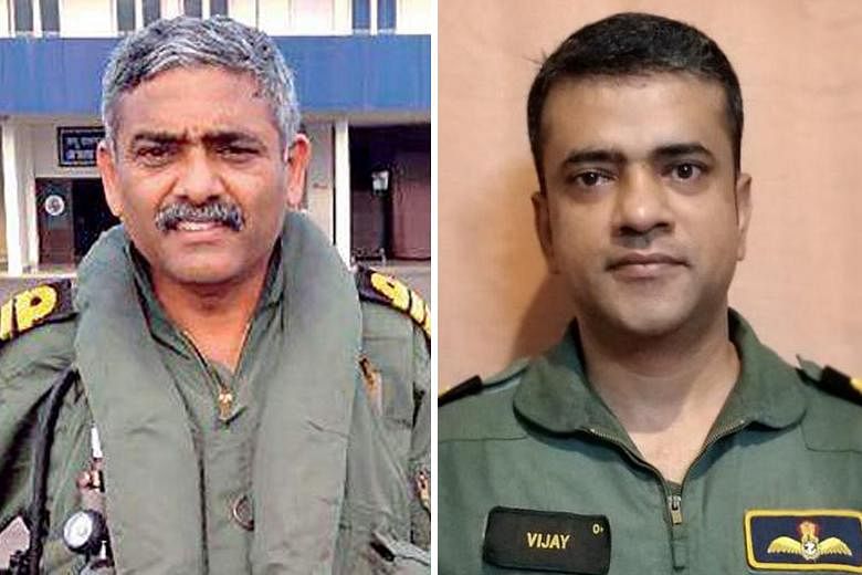 Captain P. Rajkumar (left) and Commander Vijay Varma were among India's navy pilots who undertook high-risk missions to save people from rooftops and isolated land as the southern state of Kerala battled a flood crisis in August. The AHA Centre was e
