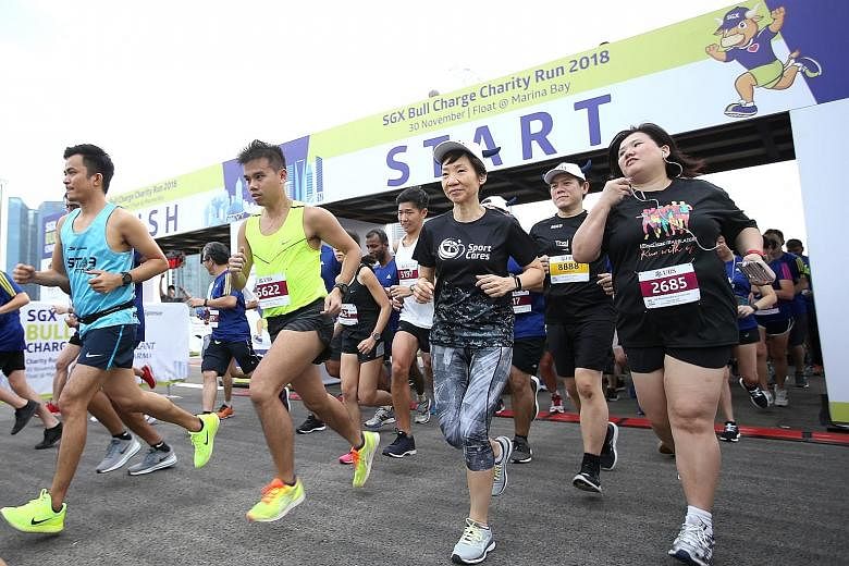Charity run SGX Bull Charge raised more than $3.3 million for six beneficiaries - AWWA, Autism Association (Singapore), Community Chest, Fei Yue Community Services, HCSA Community Services and Shared Services for Charities - the highest amount in ove