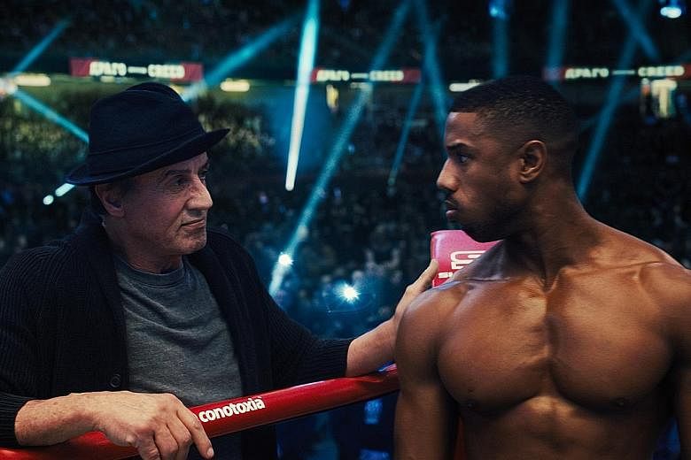 Sylvester Stallone (far left) plays Rocky, the trainer of boxer Adonis Creed, played by Michael B. Jordan (left).
