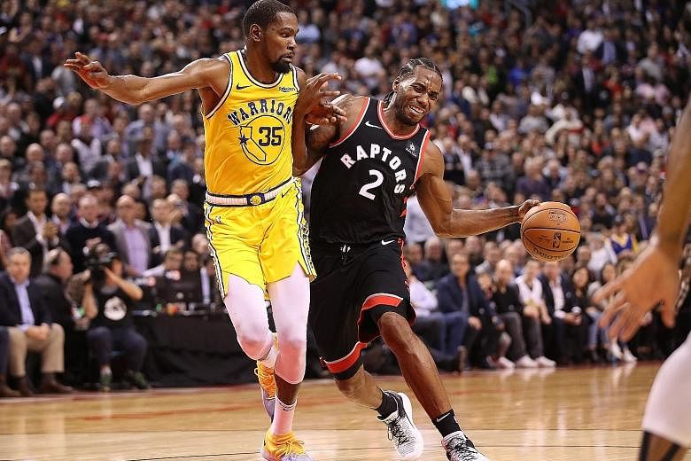 In a battle of the two teams' top scorers, a monster 51-point effort by Golden State's Kevin Durant was not enough, with Raptors forward Kawhi Leonard contributing 37 points in Toronto's 131-128 overtime win over the Warriors on Thursday.