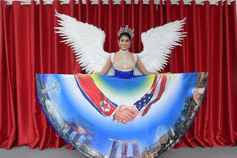 The Miss Universe Singapore costume - worn here by pageant winner Zahra Khanum - is based on the Trump-Kim summit theme. It has been called ugly by many netizens, who aimed their criticism at the designer.