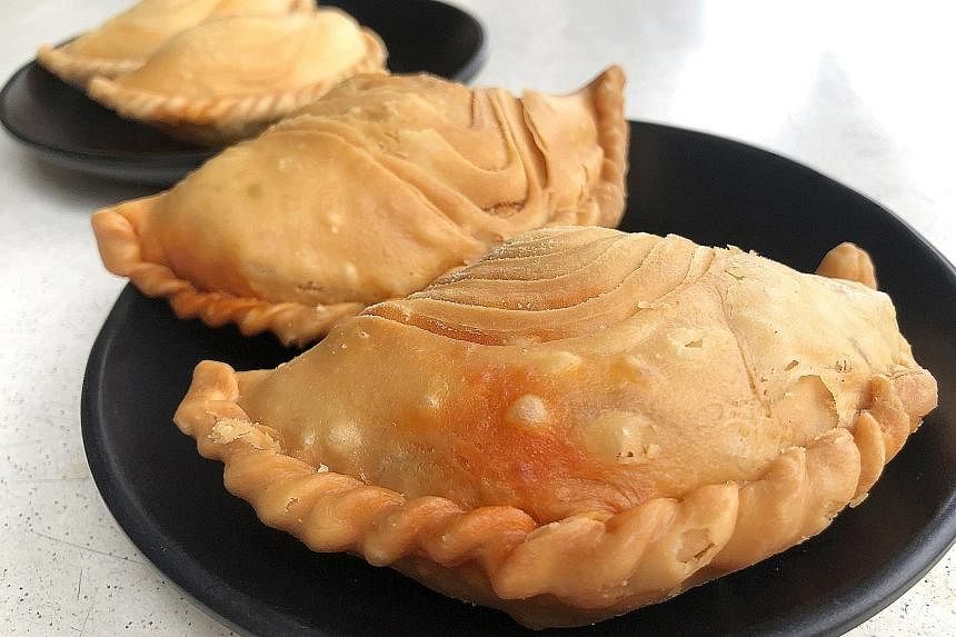 The Curry Chicken Puff at Soon Soon Huat Curry Puff has an addictively flaky pastry, which houses a warm, comforting filling.