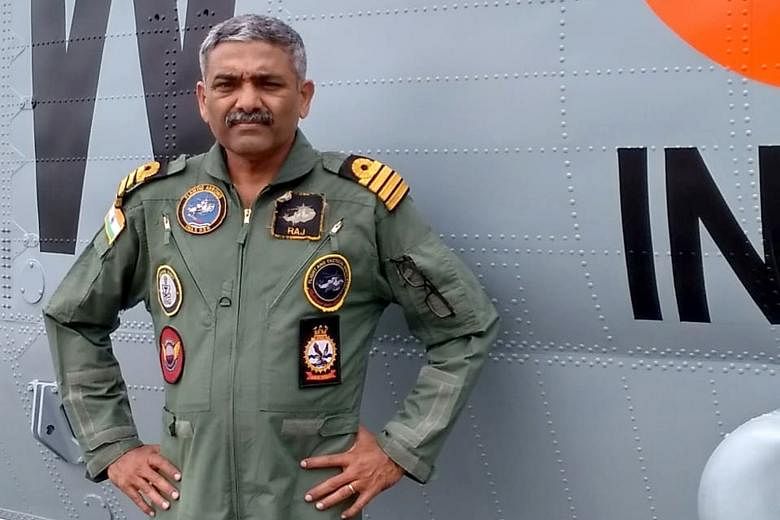 Commander Vijay Varma (left) rescued 26 people during the Kerala floods, and Captain P. Rajkumar, 114 people. The two Indian Navy helicopter pilots say the search and rescue mission in Kerala during severe flooding in August was their most challengin
