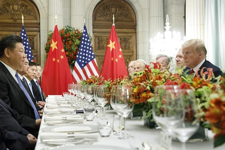 US President Donald Trump and Chinese President Xi Jinping at a bilateral dinner meeting during the Group of 20 summit in Buenos Aires, Argentina, on Saturday. The two leaders have paused their trade war, opening a 90-day window for negotiations.