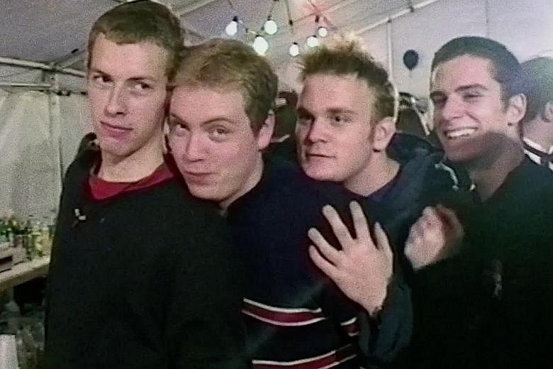 (From left) Chris Martin, Jonny Buckland, Will Champion and Guy Berryman in Coldplay: A Head Full Of Dreams, a kaleidoscopic jaunt through the band's meteoric rise from playing seedy club gigs to their most recent stadium-filling world tour.