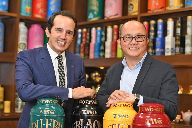 V3 founder, chairman and chief executive Ron Sim (at right) with TWG Tea chief Taha Bouqdib. V3 owns the TWG Tea brand as well as franchise rights to the GNC nutritional supplements brand in Singapore, Malaysia and Taiwan.
