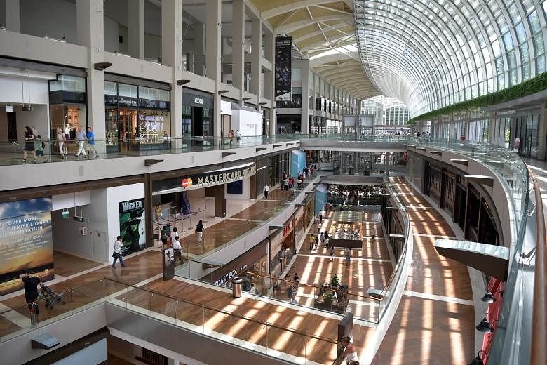 The luxury shopping mall at The Shoppes at Marina Bay Sands. A wealth report by Swiss private banking group Julius Baer found that luxury goods for women have heftier price tags on average compared with those for men.