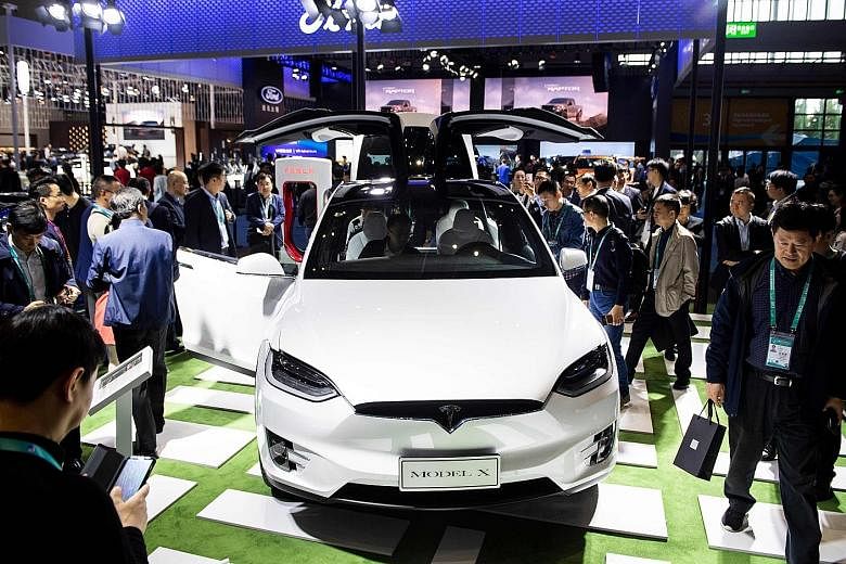Tesla Motors' Model X car on display at the China International Import Expo in Shanghai last month. American cars are among US imports into China that have been hit by tariffs in the trade war. As part of the US-China ceasefire, both sides held off o