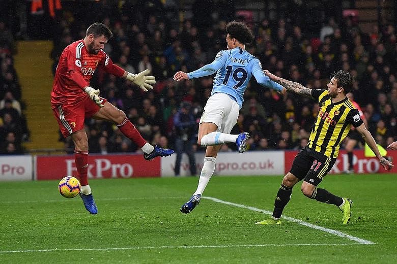 Manchester City winger Leroy Sane scoring the first goal in his side's 2-1 victory over Watford at Vicarage Road on Tuesday. It was not an easy win for Premier League leaders City, who had to hang on for the three points after Watford scored in the 8