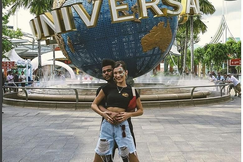 Canadian singer The Weeknd and his supermodel girlfriend Bella Hadid had a screaming good time in Sentosa a day before his concert at the Singapore Indoor Stadium on Wednesday. They visited Universal Studios, where they rode on roller coasters. He bo
