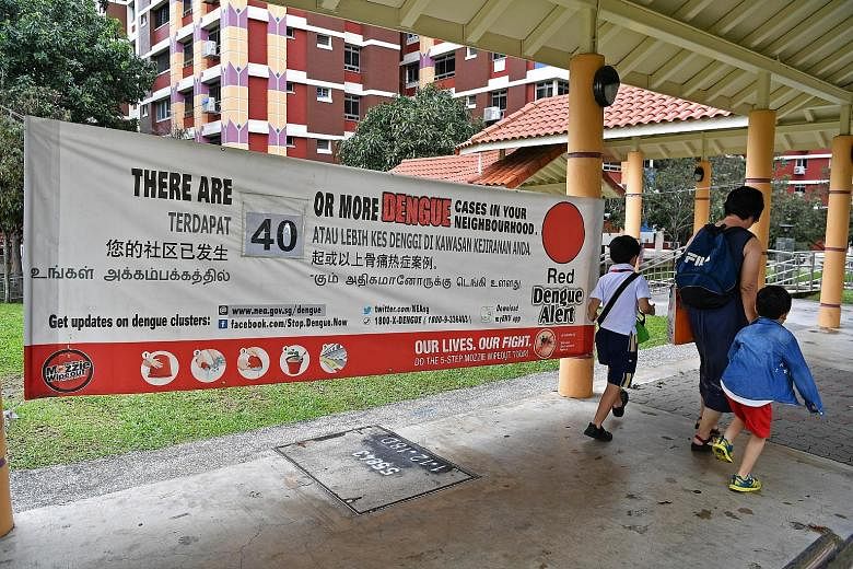 Besides putting up alert banners and posters, the NEA is also working with the community to conduct house visits to raise awareness, with pamphlets and insect repellent distributed during the visits.