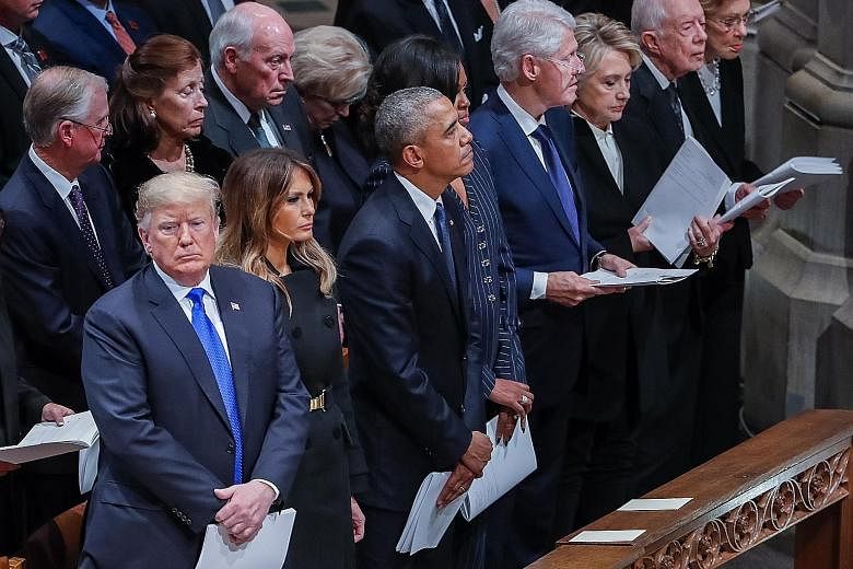 From left: US President Donald Trump, First Lady Melania Trump, Mr Barack Obama, Mrs Michelle Obama, Mr Bill Clinton, Mrs Hillary Clinton, Mr Jimmy Carter, Mrs Rosalynn Carter at the funeral service for former president George H. W. Bush on Wednesday