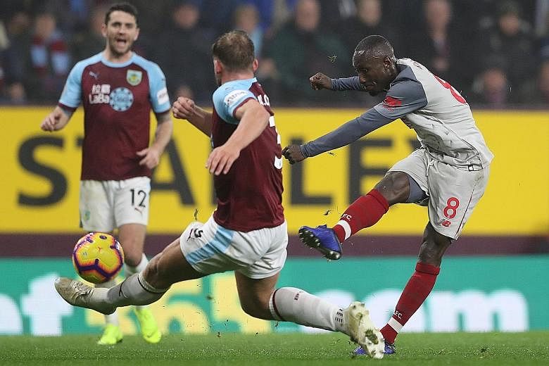 Liverpool's Naby Keita going close with a shot against Burnley in their 3-1 win on Wednesday at Turf Moor. Manager Jurgen Klopp is pleased with his work rate and creativity.