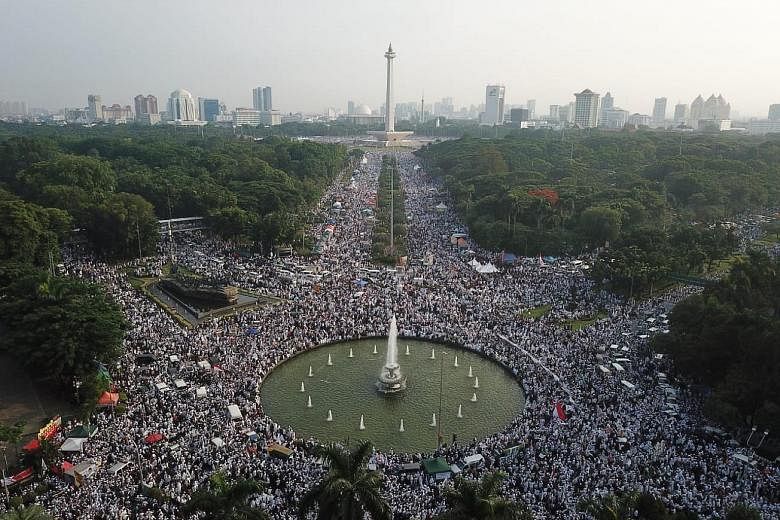 Hundreds of thousands of Muslims at Jakarta's Monas national monument last Sunday to mark the second anniversary of the Dec 2, 2016, protest against former governor Basuki Tjahaja Purnama for insulting Islam. Protesters at the Sunday rally called for
