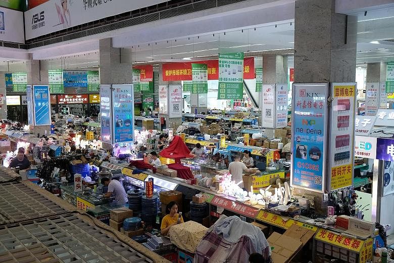 One of Shenzhen's Huaqiangbei electronic markets, where suppliers are packed elbow-to-elbow selling all sorts of electronic components.