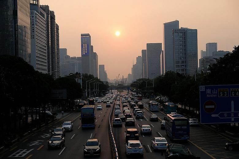 Shenzhen was an experimental field for China's economic reforms which began in 1978. Today, it is a booming mega-city of 20 million people, with skyscrapers lining the metropolis' Shennan Boulevard (above).