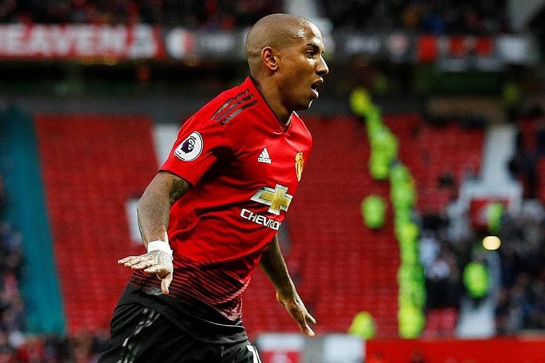 Ashley Young, Manchester United's captain for the day, celebrating after his shot into the top corner gave them an opening goal against the English Premier League's bottom club Fulham. The hosts added to the 13th-minute strike through Juan Mata, Rome